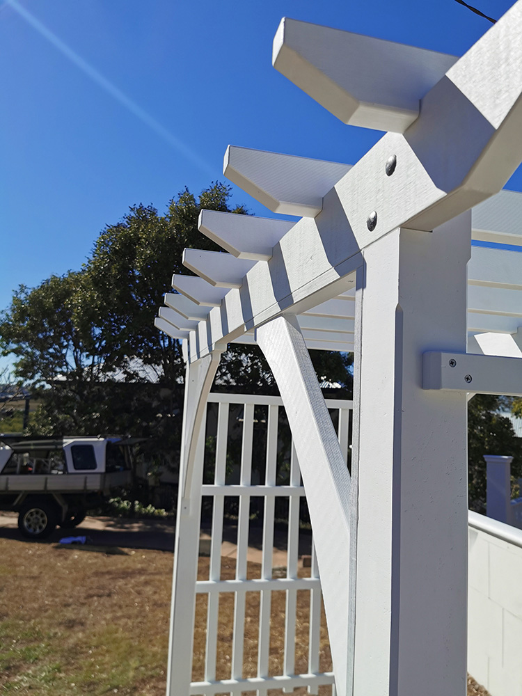 The rafters have been notched into the beams on this Arbour.