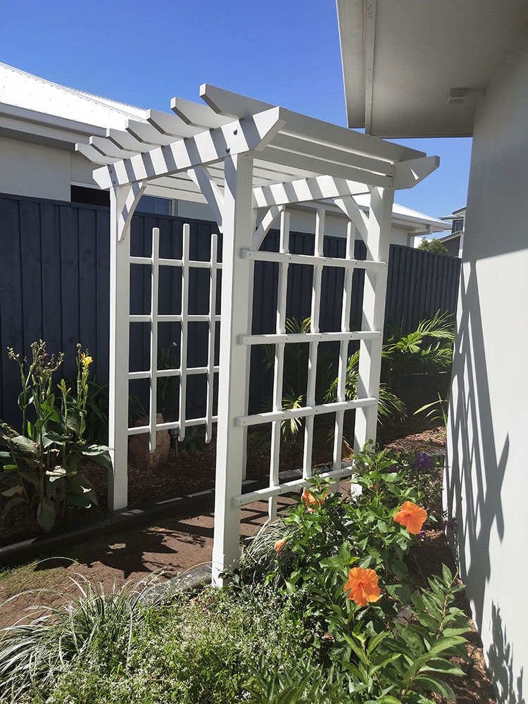 Set over the pathway the arbour looks lovely set into the garden flowers.