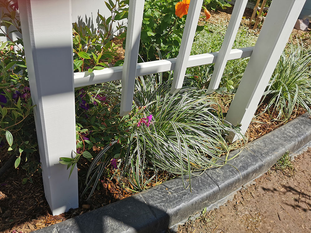 The Garden Arbour has Hardwood Posts that have been concreted in ground. The Posts have been set just outside the path and once concreted the bark mulch has been replaced for a beautiful finish. Garden Envi leaves every residence clean and tidy.