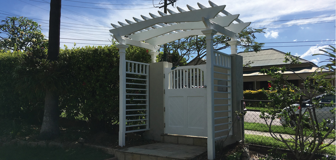 Corbels and Rafters have been hand-crafted to match original 1915 house features and side screening has been added for flowering vines to climb.