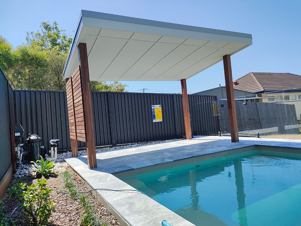 This Pool Cabana has some screening added to hide the pool pump as well as provide additional shade for the sitting area.