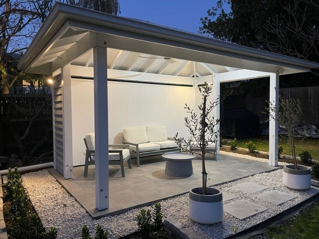 Wow, the client's Cabana is looking amazing! Landscaping is finished, and they've even added some outdoor furniture. The night time shot looks fantastic!