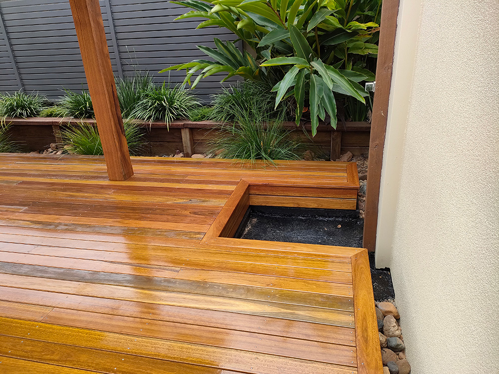 The deck has been framed around the pre setshower area and a new grate will be inset into the shower space.