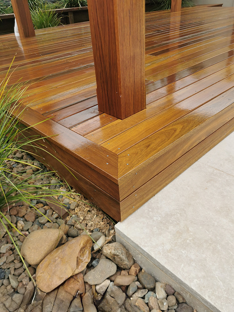 Spotted Gum decking has been selected and we have set the decking board to hover just above the tiled pool surround for a seamless finish into the tiled area.