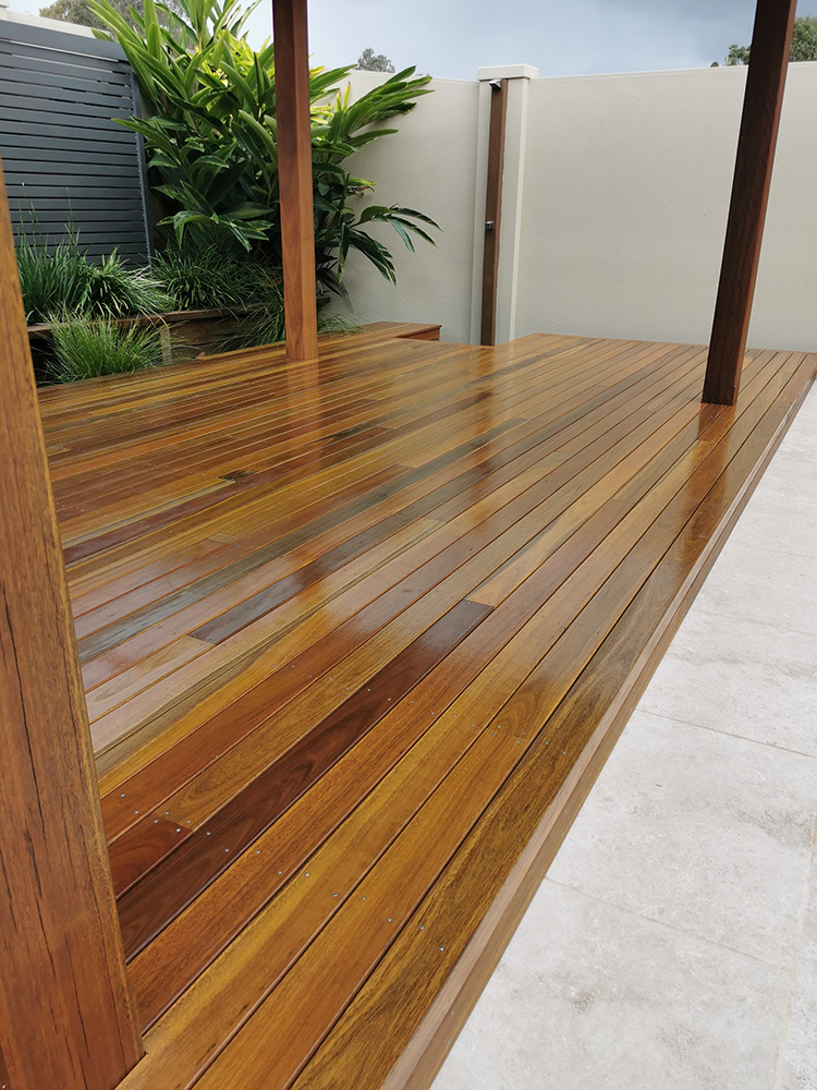 Spotted Gum decking has been selected and we have set the decking board to hover just above the tiled pool surround for a seamless finish into the tiled area.