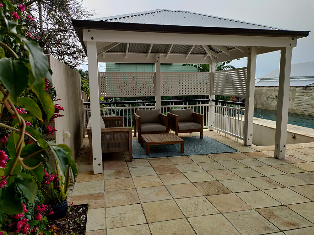 The White Gazebo has been built with handrails and lattice screening that match the beautifully renovated Queenslander residence in the Churchie district of East Brisbane.