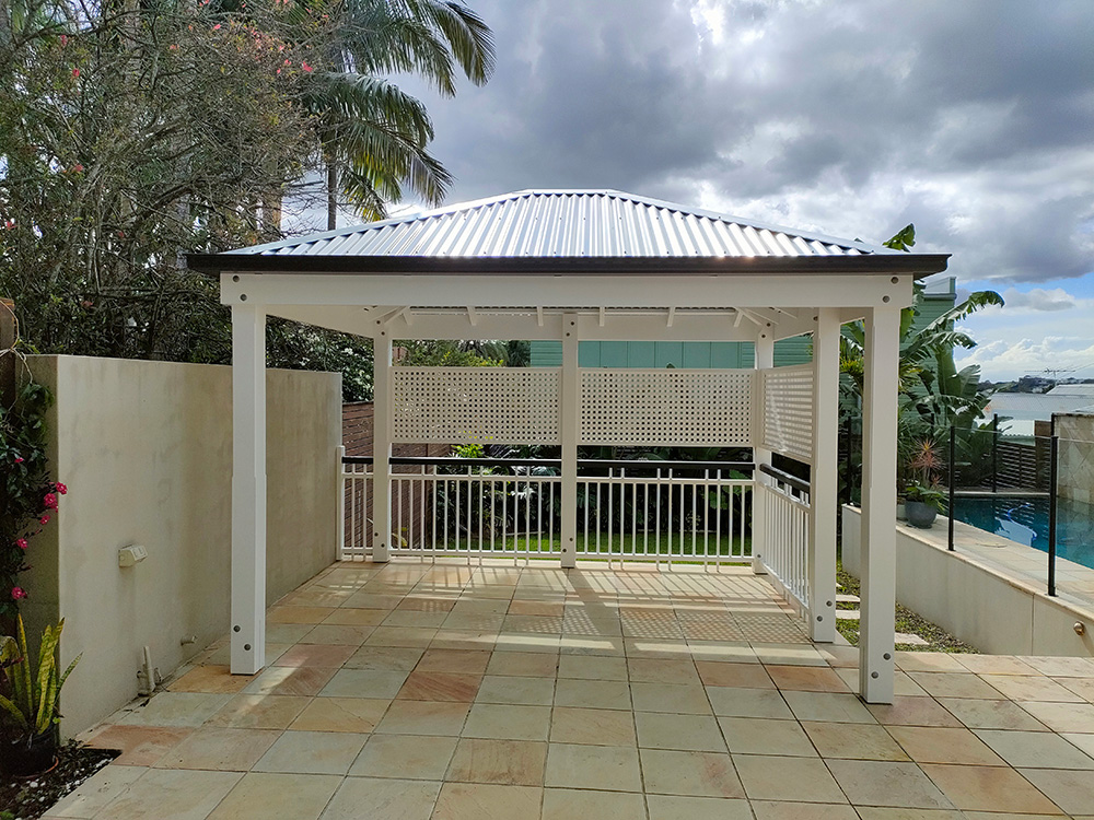 Special ordered Micro Lattice has been added that matches the lattice panels on the house and provides privacy from the neighbours for this setting that looks over and into the pool area.