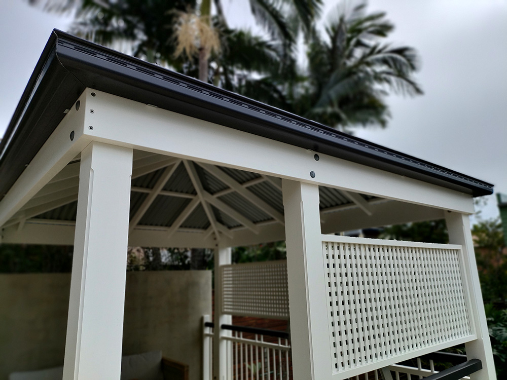 A Zincalume Colorbond roof and with Monument gutter have been added and the outside beams provide the fascia for this Gazebo. Minimal fixings can be seen on the entire gazebo, only the Galvanized Bolts and exactly placed galvanized screws on the beams can be seen.