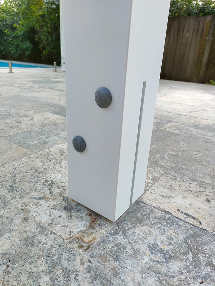 The Posts have been attached onto the new tiled pool surround with a knife plate bracket. They are hand cut and then carefully painted for beautiful finish.