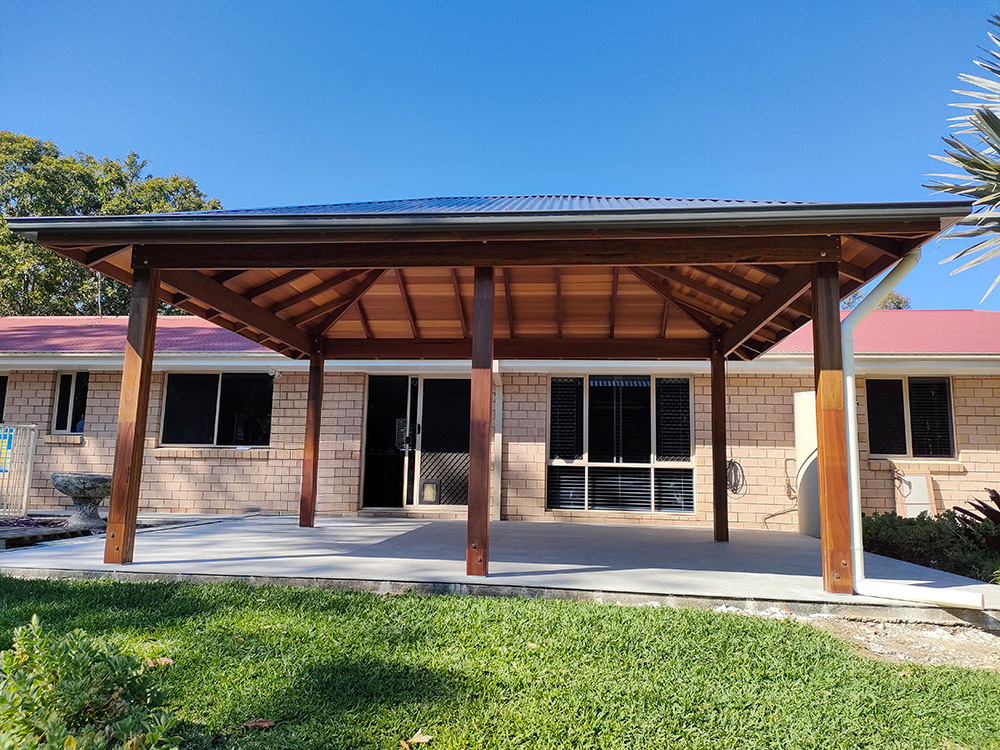 This gazebo has been set into an existing entertainment area and the new gazebo covers the entire area.
