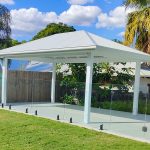 This lovely white Gazebo looks beautiful beside the pool and large lawn at this residence in Sherwood, QLD.
