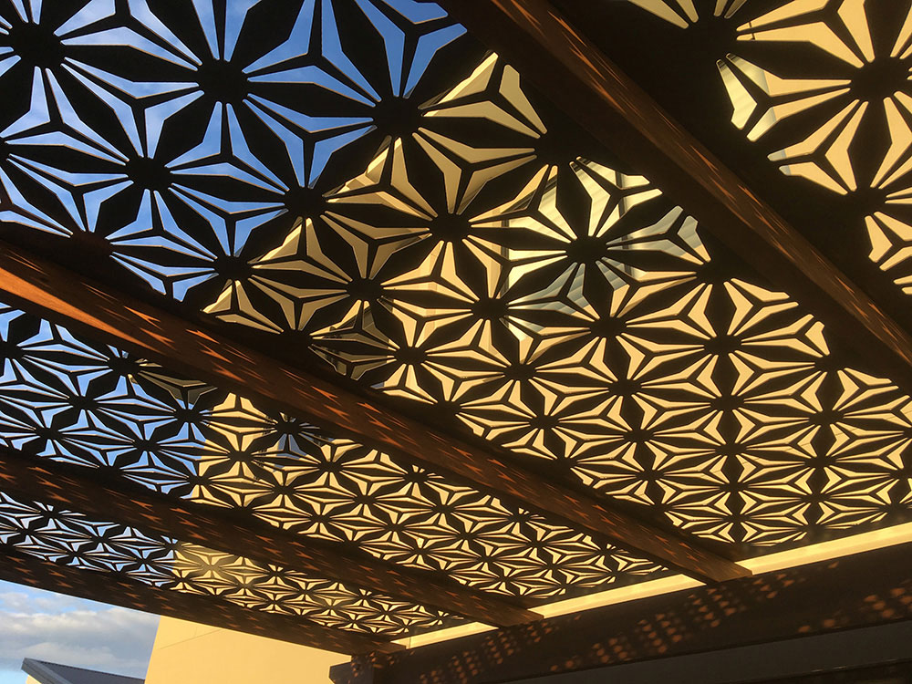 Spotted Gum Timber Pergola with Decorative Aluminium Screening