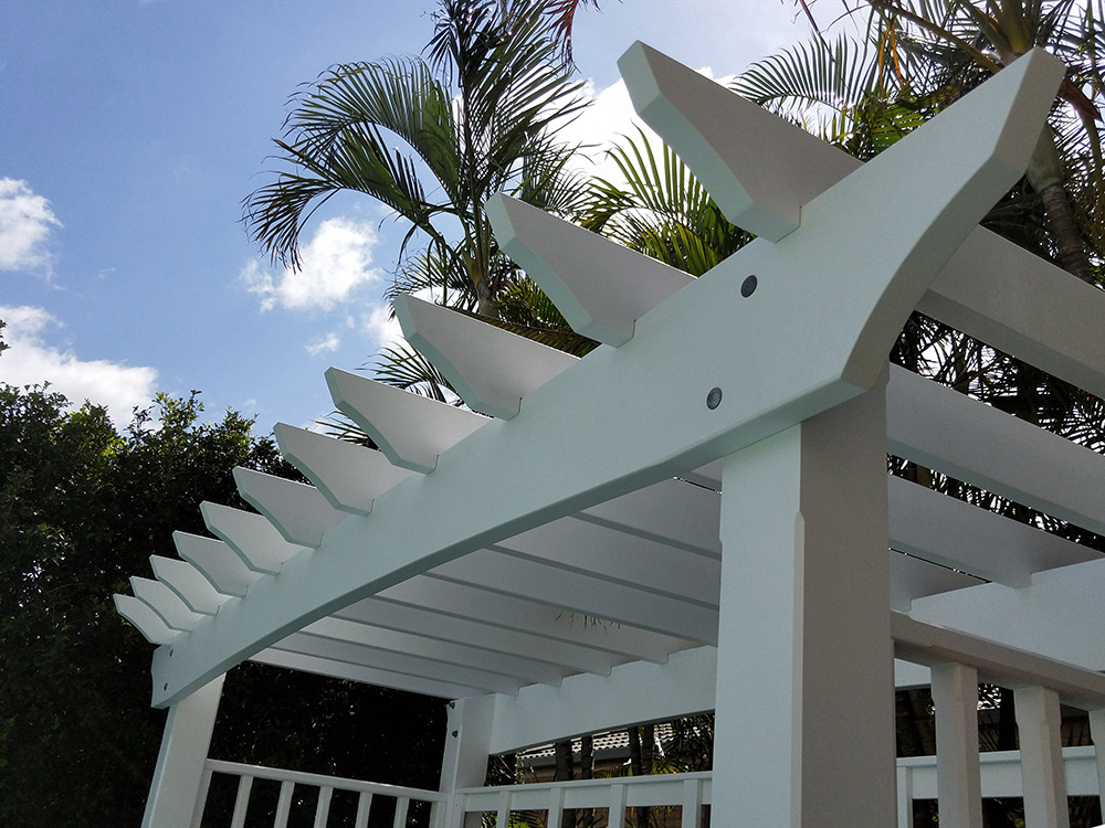 The arched beams feature in this Pergola creating a stunning look for this Pergola.