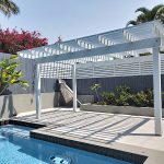 This pine Pergola is painted in Light Grey, Dulux Cold Steel and it has created an additional entertainment area out by the pool.