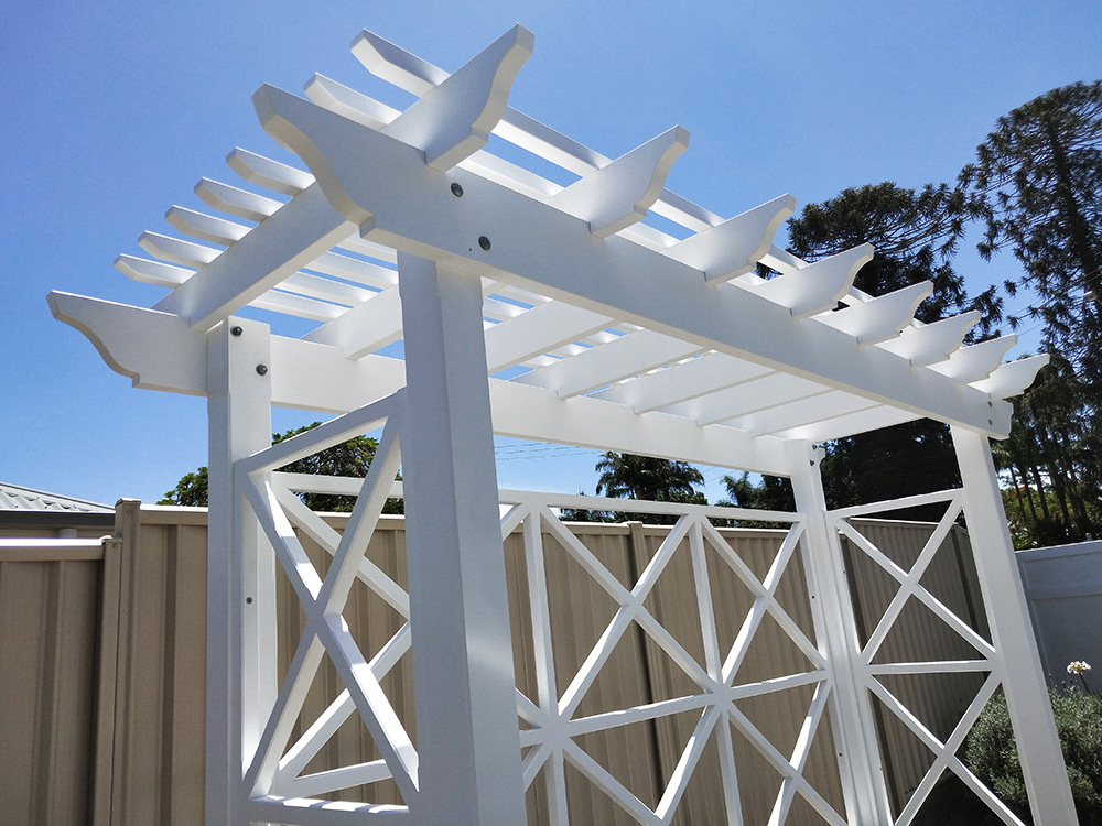 This painted white Pergola has the OGEE profile selected and it looks fantastic in this hand selected solid Pine timber.