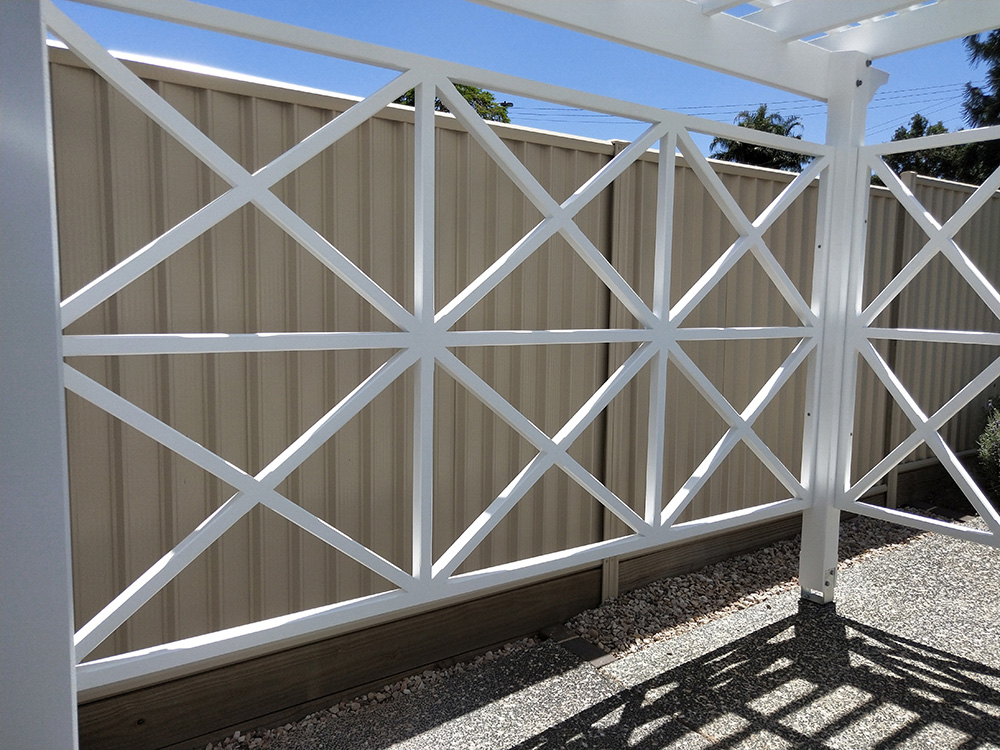 This Pergola has had X screening added as the features. Flowering vines are planned to grow up and around the Pergola.