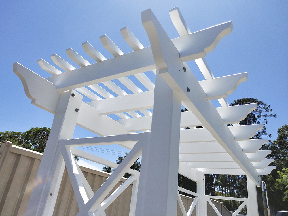 This painted white Pergola has the OGEE profile selected and it looks fantastic in this hand selected solid Pine timber.
