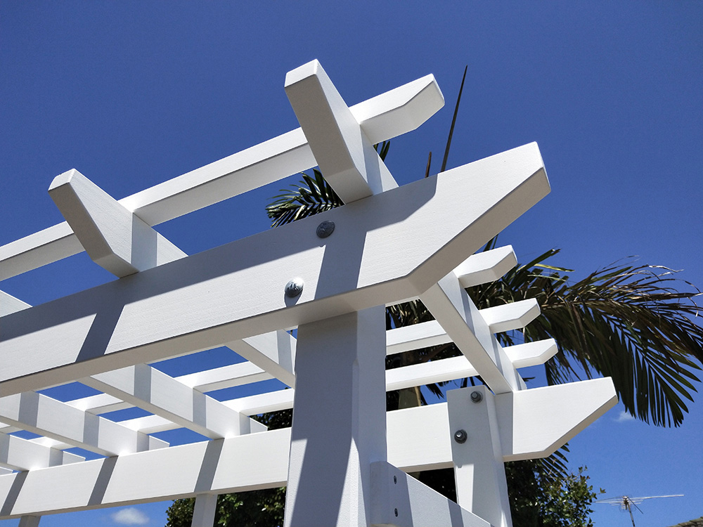 The splayed Pergola profile has been selected for this painted Pine Pergola.