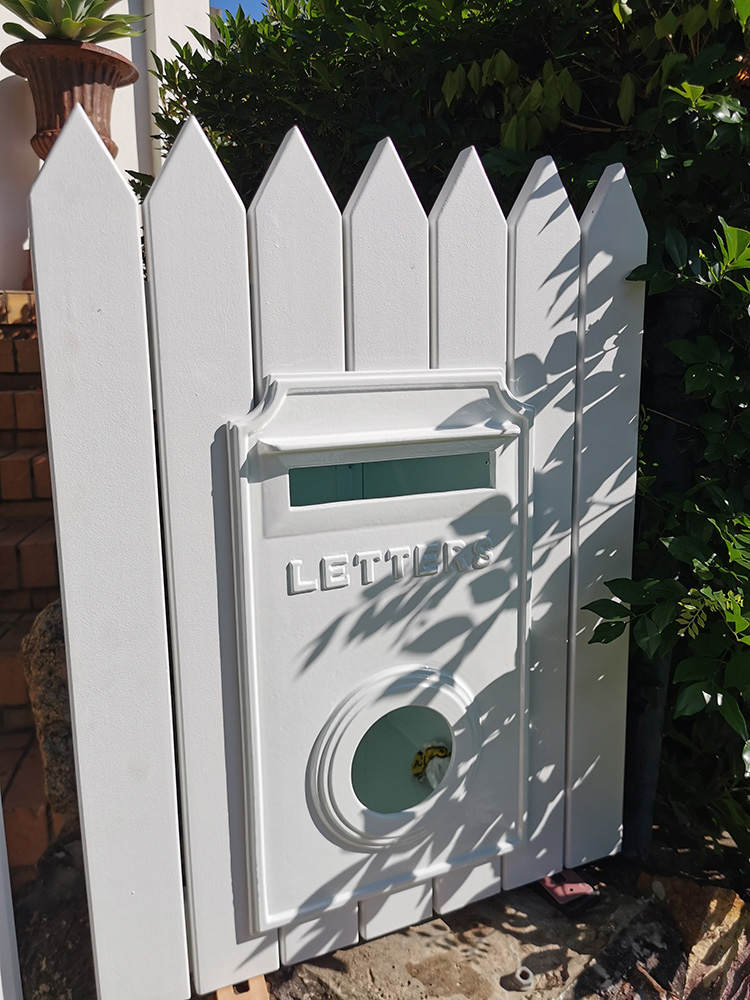 This little white mailbox has been added beside the new gate and looks lovely at the front entrance.