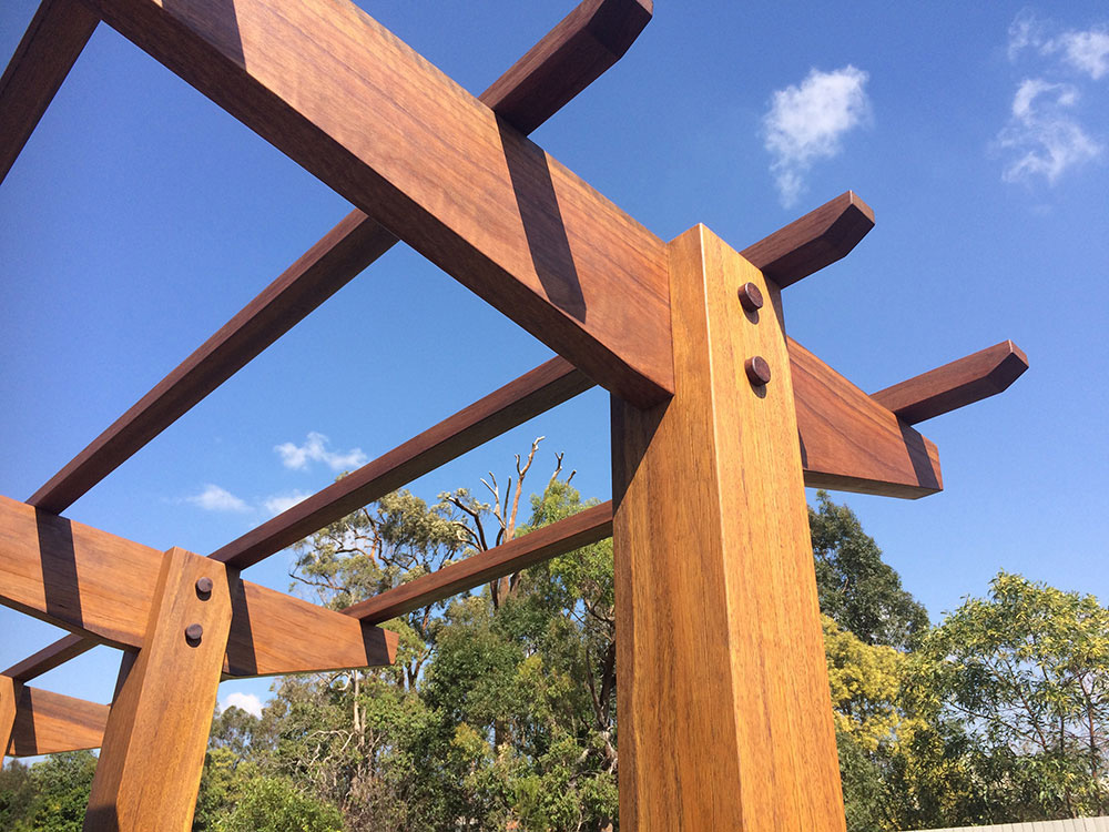 Rafters are cut into the posts to create a mortise connection and timber pinned to show a flawless finish.
