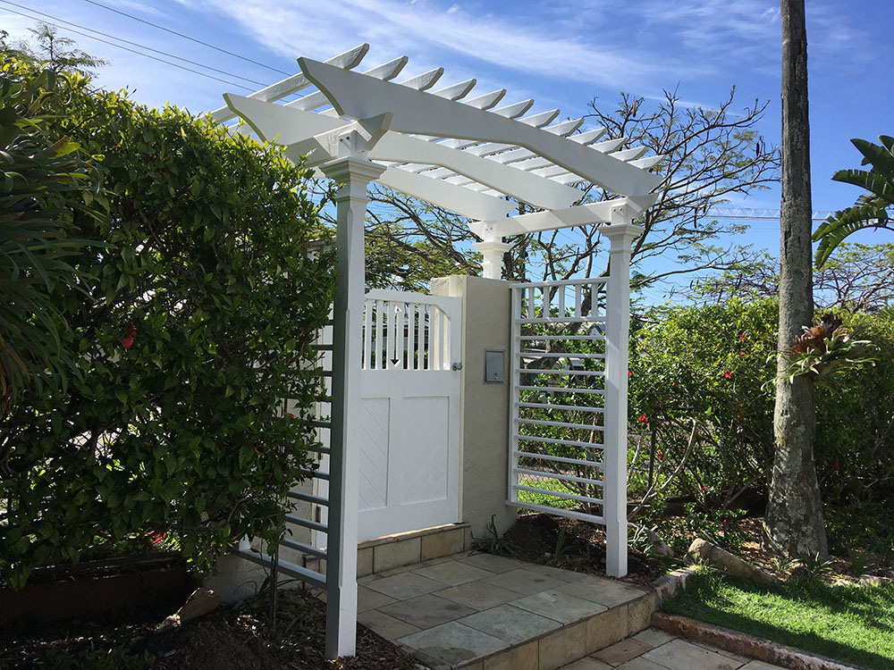 Corbels and Rafters have been hand-crafted to match original 1915 house features and side screening has been added for flowering vines to climb.