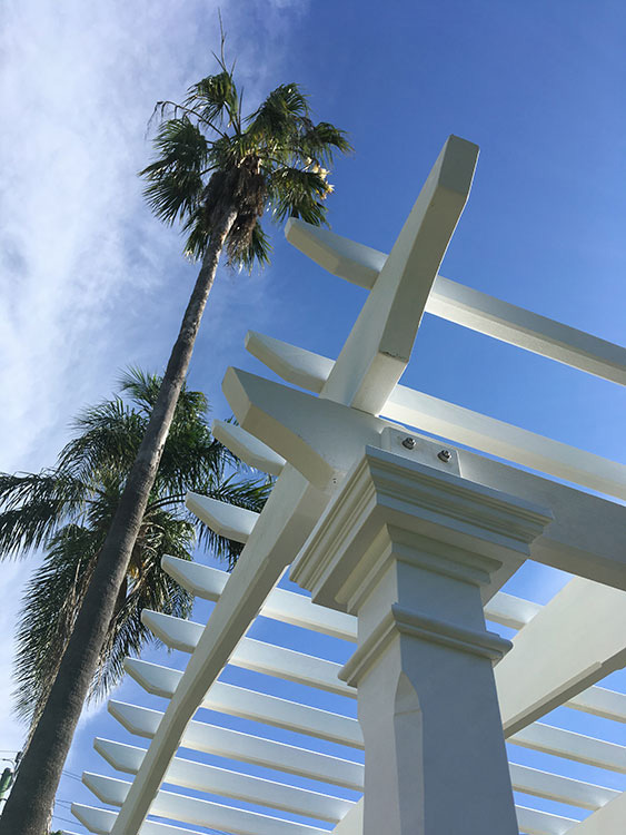 Corbels and Rafters have been hand-crafted to match original 1915 house features and side screening has been added for flowering vines to climb.