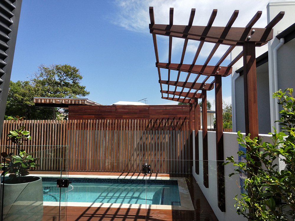 The Spotted Gum has been oiled to match the Merbau screening that will be added, creating a rich reddish color for the timber.