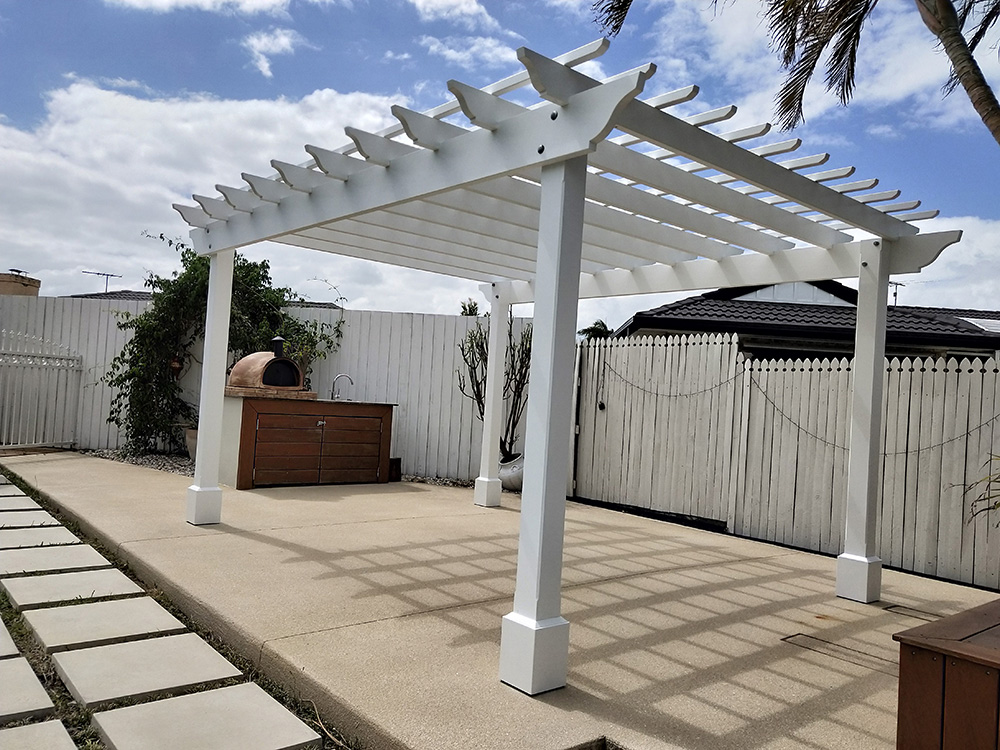 This painted Pine Pergola looks great with the hand made decorative post boxes.