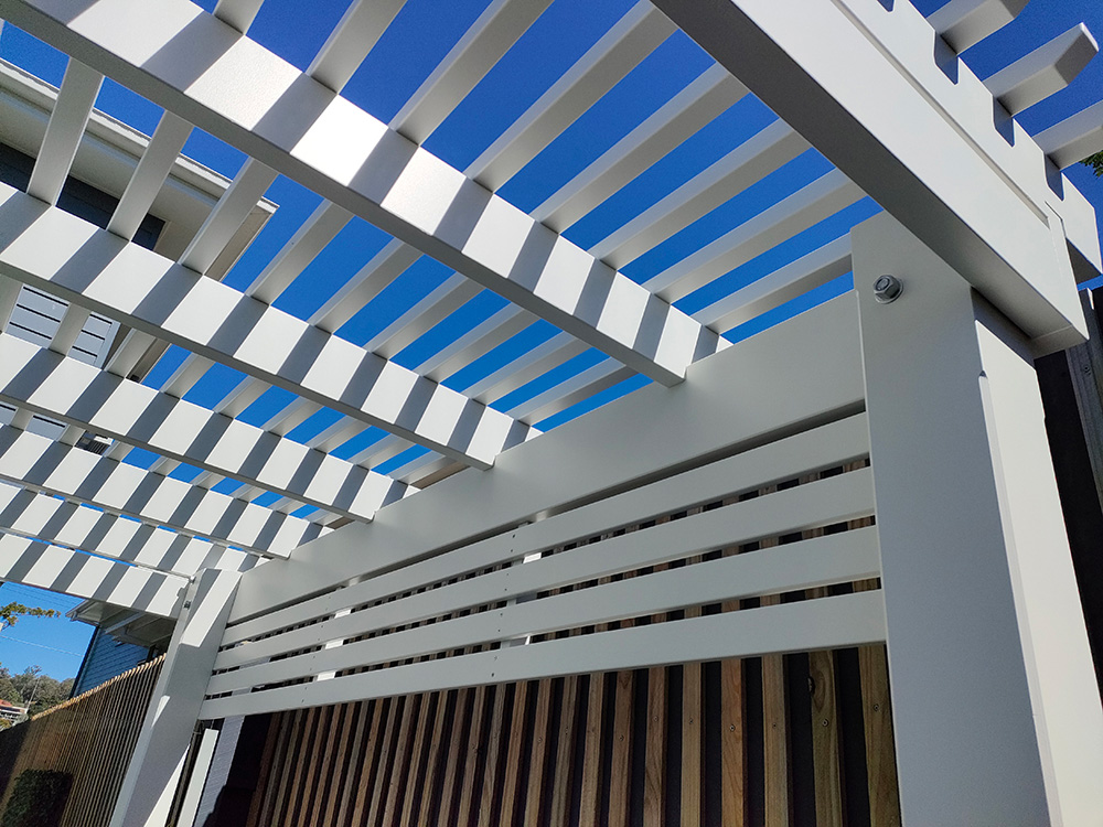 Horizontal Screening has been added to the back of this Pergola and it looks great against the side fence.