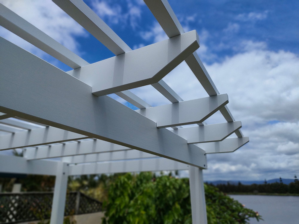 The knotched in rafters look great with the splayed Pergola profile with overhang.