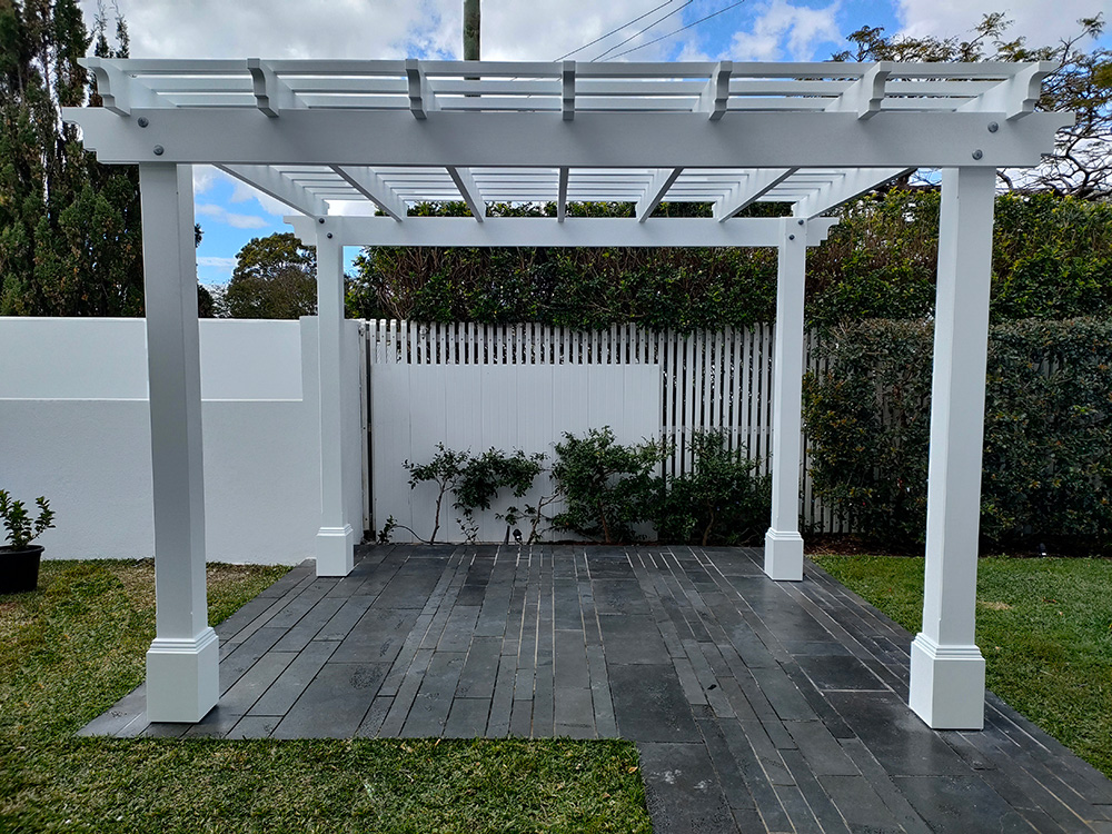 This white Pergola is set onto an existing tiled slat at this residence in Hamilton.