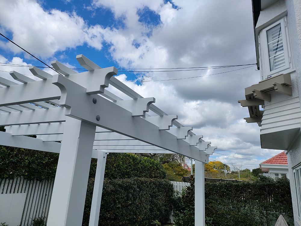 This is a new Pergola profile for us and we matched it to the residence and it looks perfect. You can see a glimpse of one of the window boxes on the house in this photo.