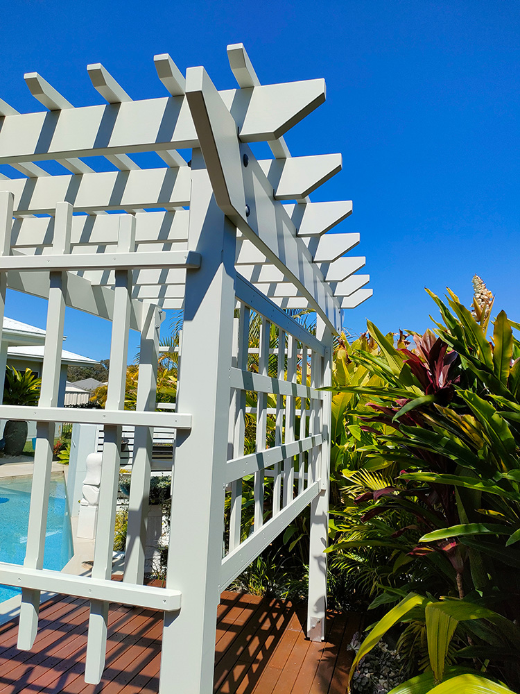 The back screening will have vines that will be trained to fill the screening and it will look fantastic in this lush garden setting beside the pool.