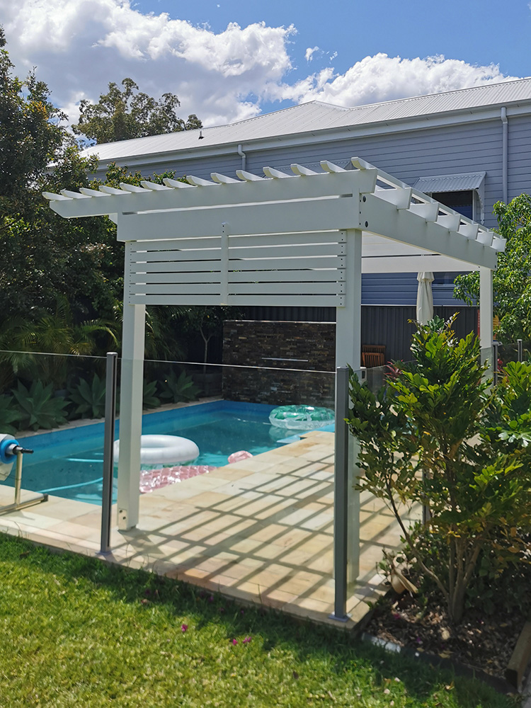 A little bit of screening has been added to the end of this Pergola providing a touch of shade as well as some privacy screening.