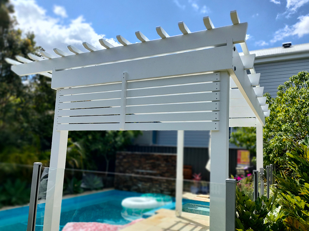 A little bit of screening has been added to the end of this Pergola providing a touch of shade as well as some privacy screening.