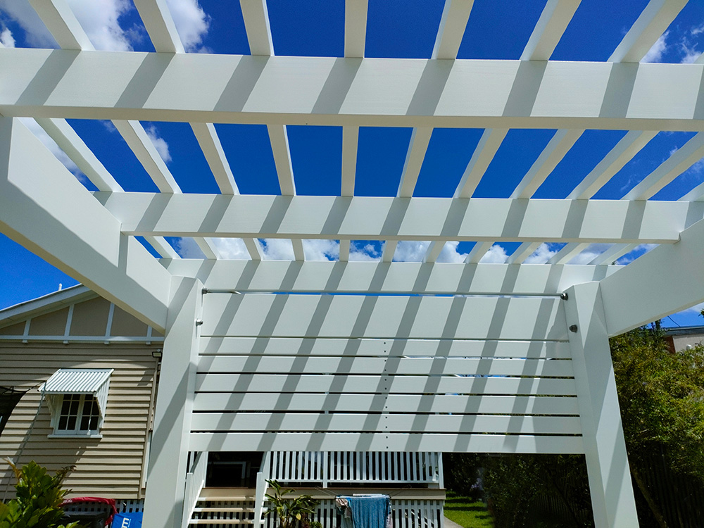 The screening on the inside of the Pergola looks great with all the screws set exactly in place.