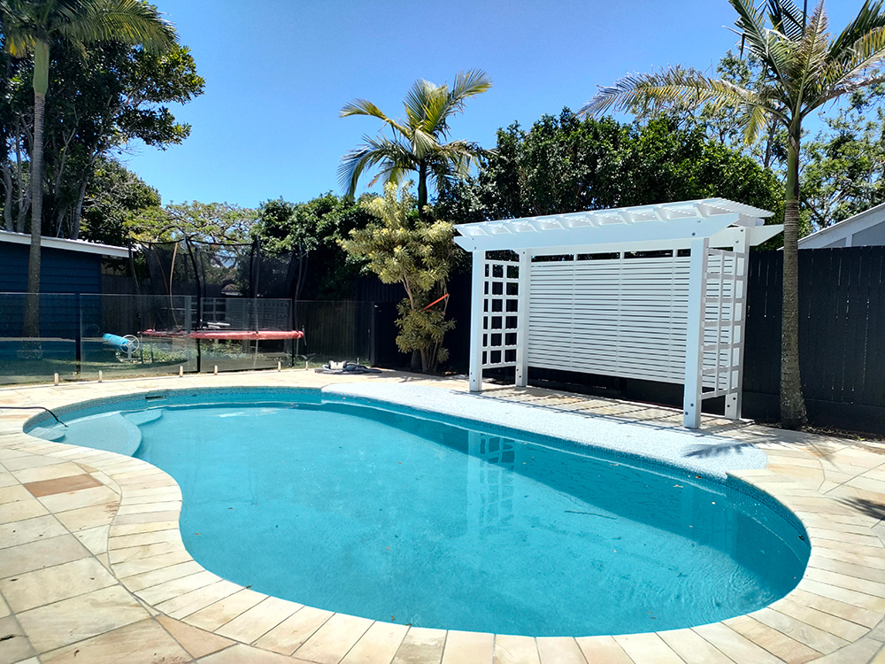This Pergola has been set beside the pool with full back screening and side screening.