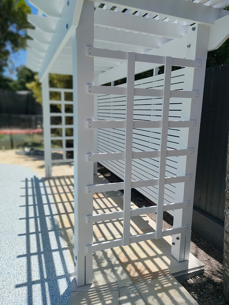 The screening looks great on it's own but you can add flowering vines that will climb through an fill in the screening to add greenery, beauty and additional shade.
