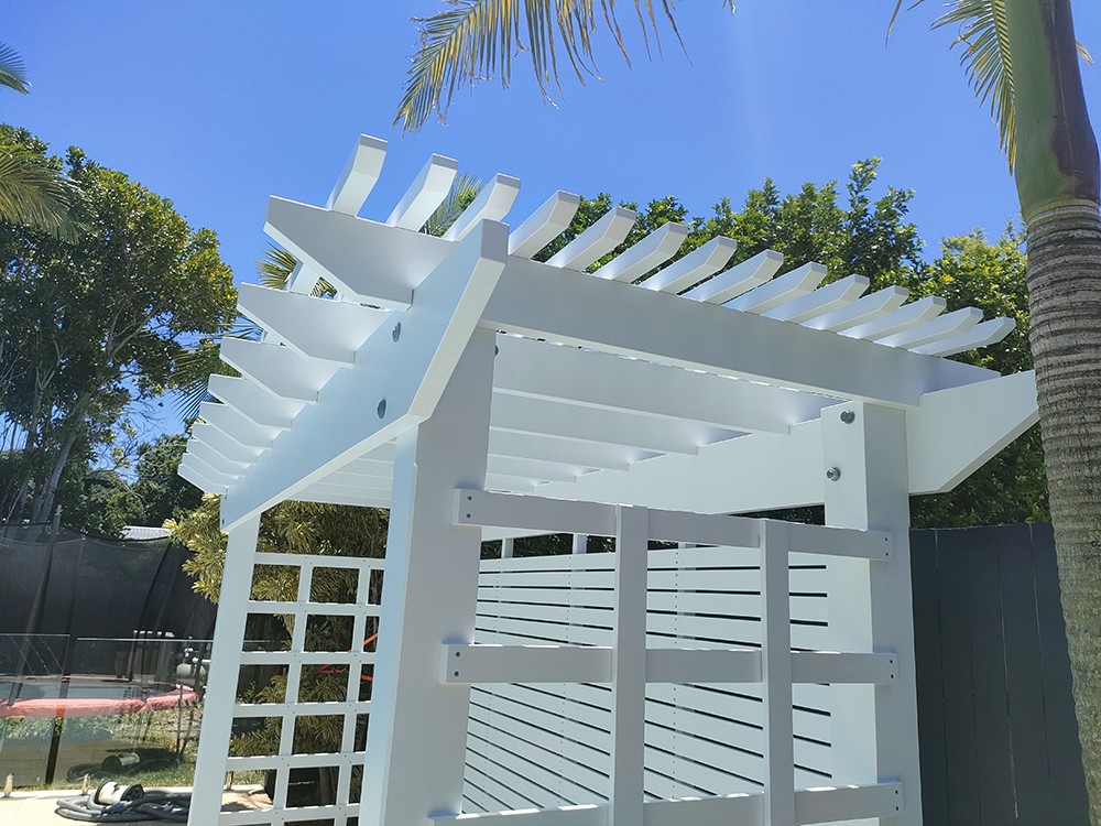 Tighly spaced timber battens have added to the roof to create additional shade.