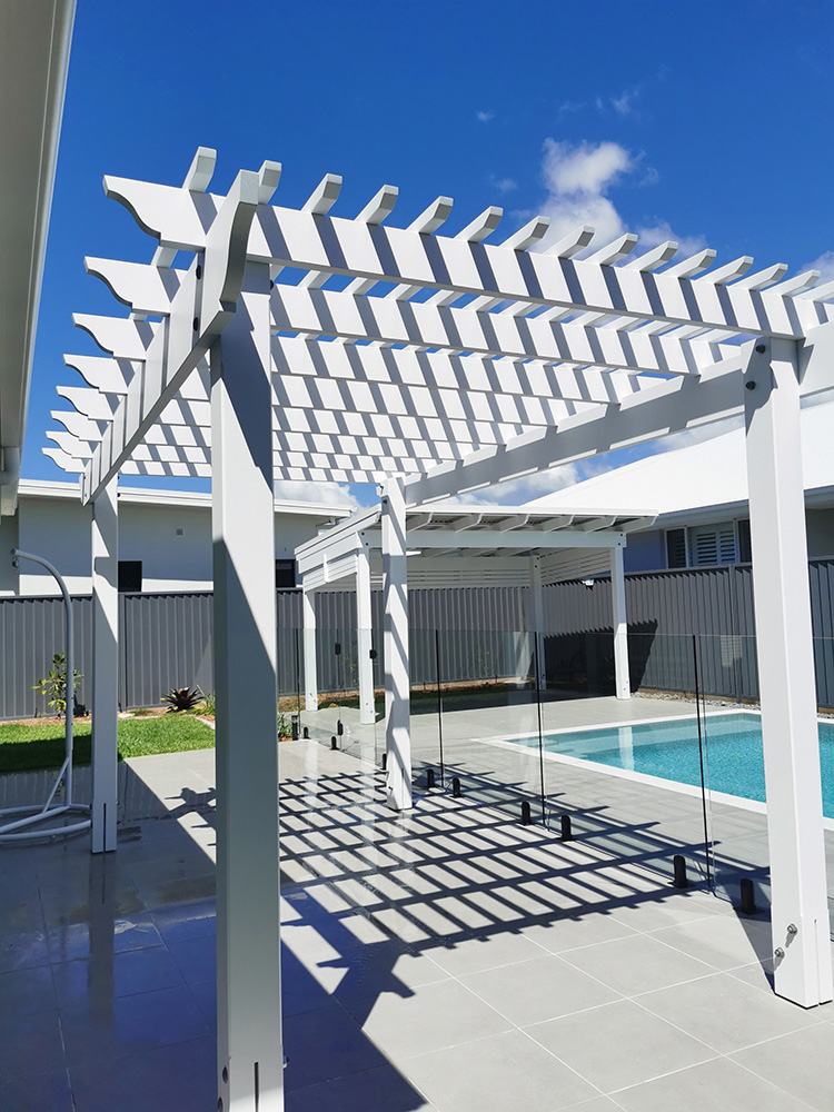 These two structures compliment each other creating a beauful backyard for this residence in Pelican Waters on the Sunshine Coast.