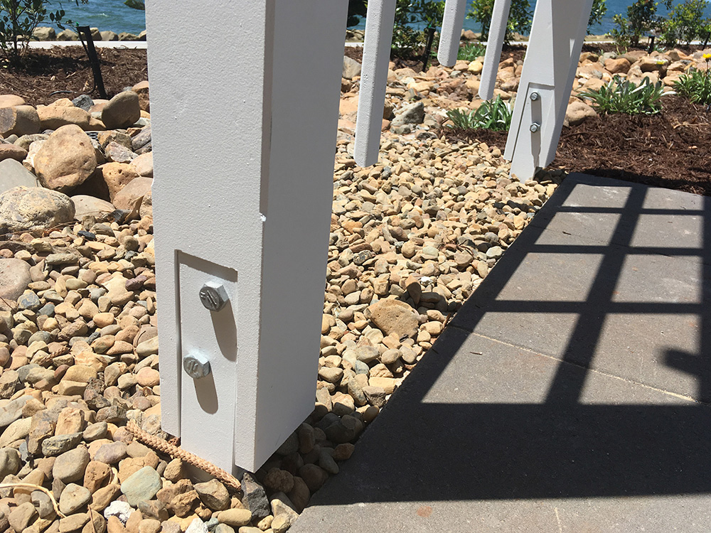 The post stirrup brackets have been concreted in ground. The LOSP treated Pine posts have been routered to fit the post brackets.