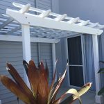 Nestled into this entrance is a new White Painted Pergola.