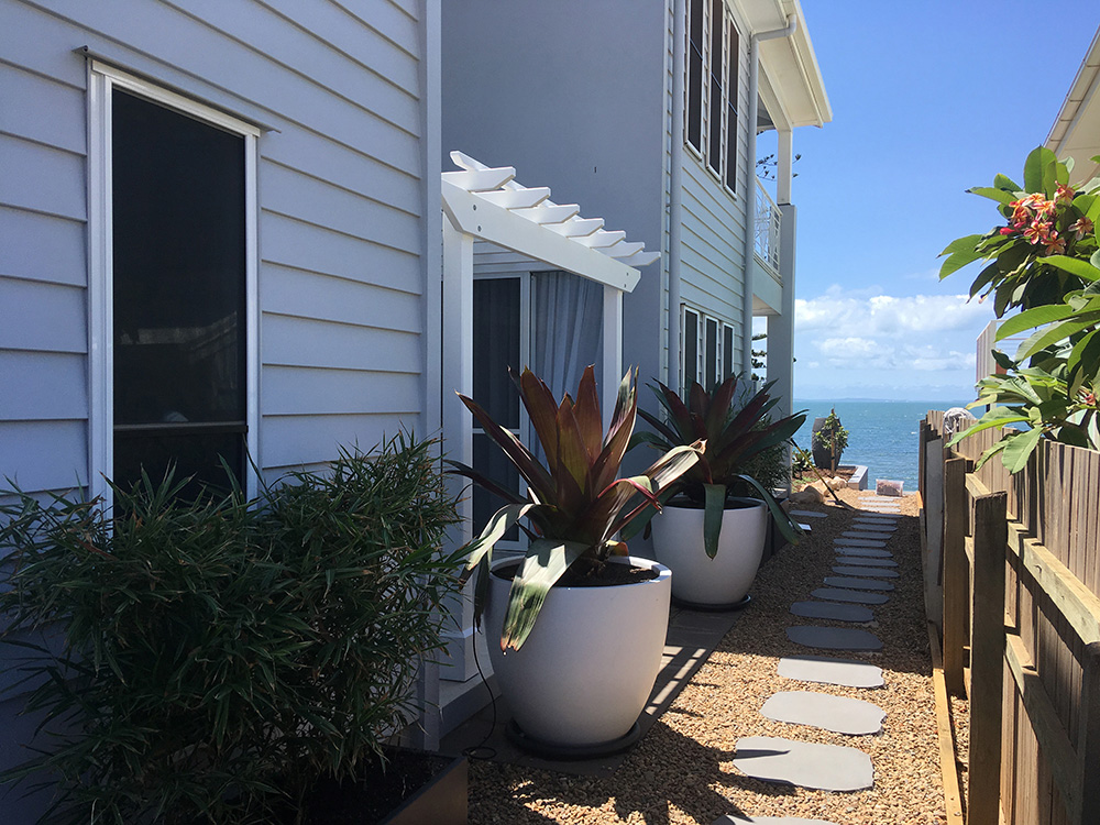 This entrance way looks fantastic with the new Pergola. It adds both depth and visual appeal to this side of the house.