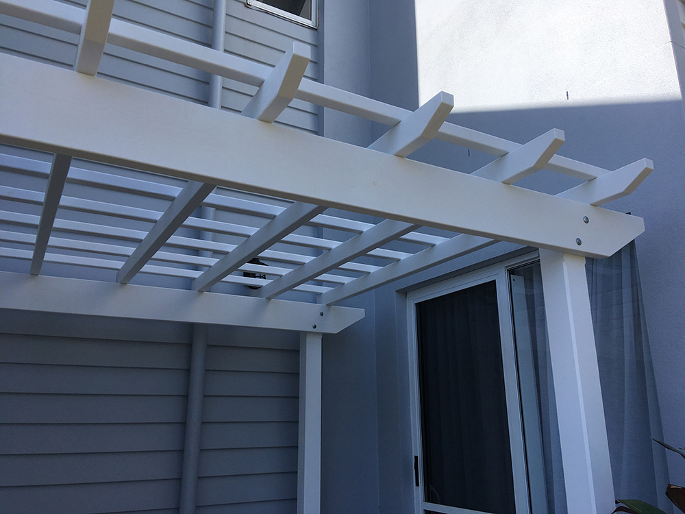Covering the side entrance to a new Hampton's style residence in Redcliff.