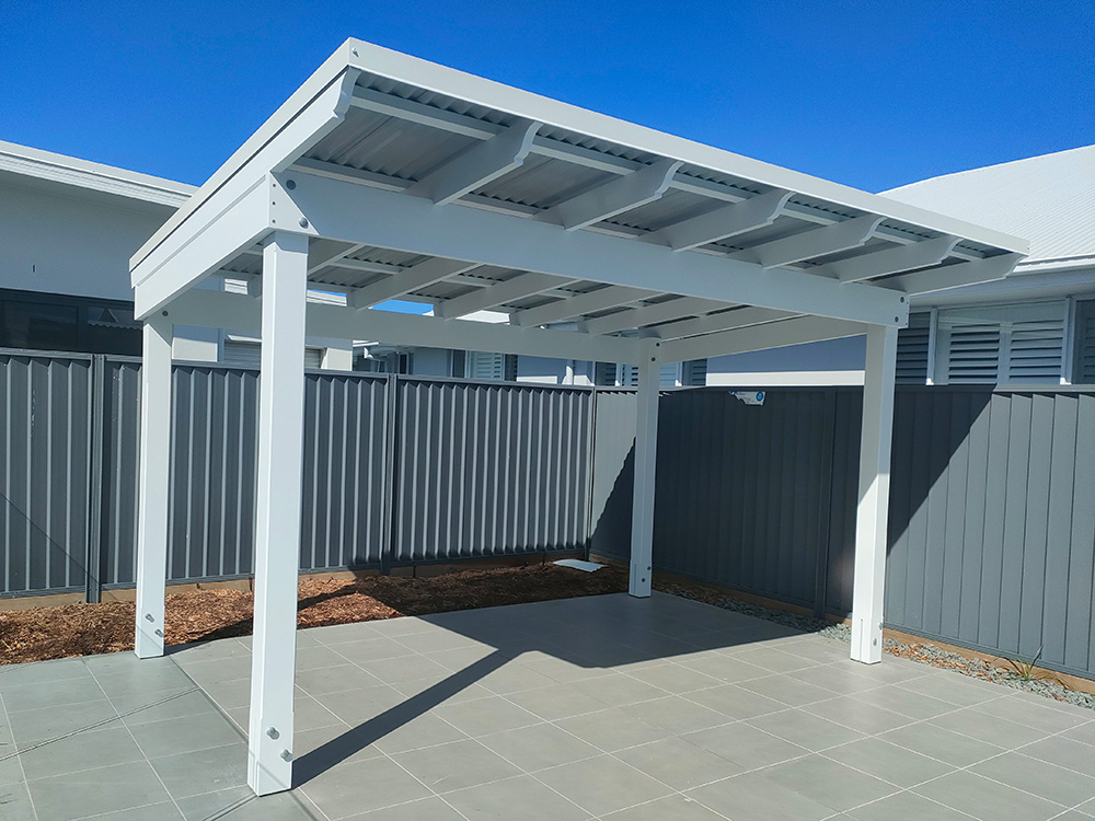 The roofed Pergola is a Skillion style roof and it looks lovely creating a new entertainment area beside the pool.