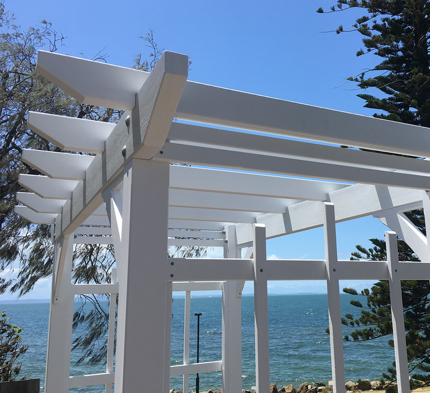 Premium Pine Arbours in a White Hamptons Style. This pretty arbour overlooks the water in Redcliffe.