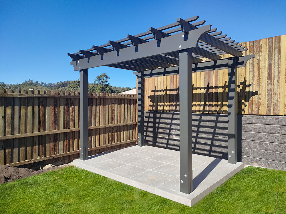 This Pine Pergola has a Quad Pergola Profile. It has been handcut and sanded to perfection to create a beautiful feature in this backyard.