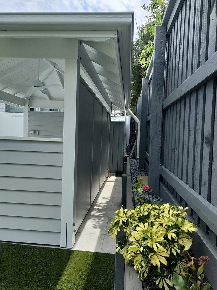 This Pool Cabana has been set just off the side boundary fence.