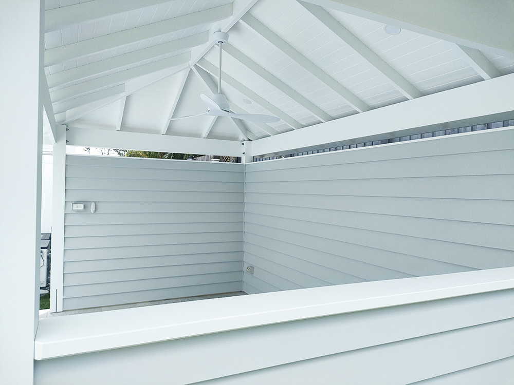 Pool Cabana with white VJ Ceiling and grey Hardie Linea cladding.