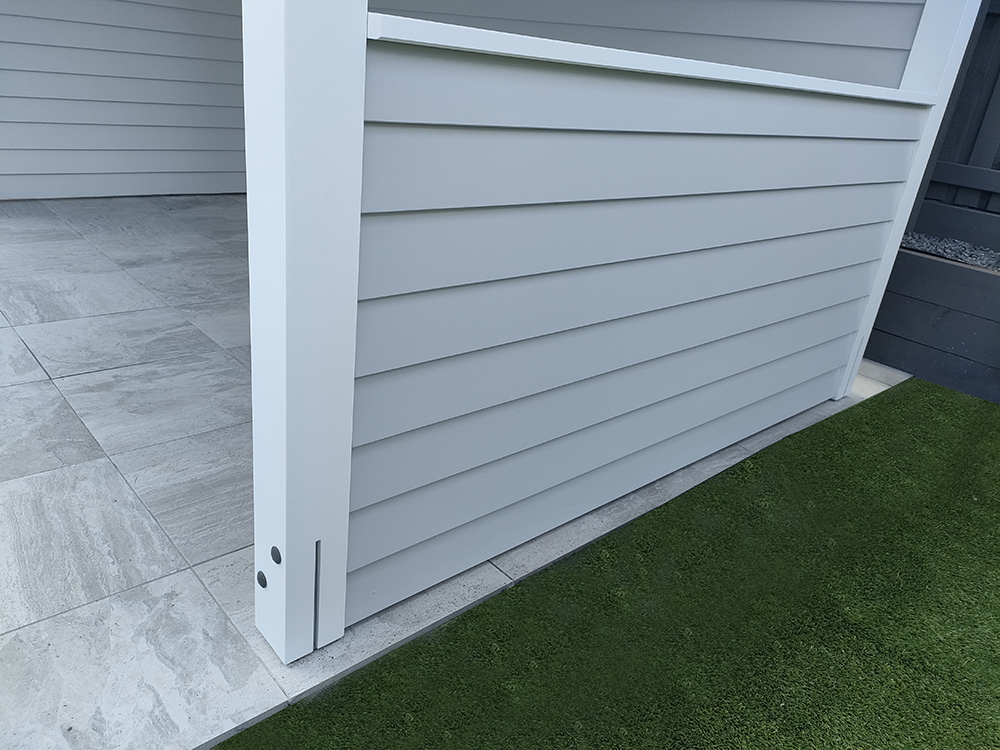 Pool Cabana with half wall with Hardie Linea cladding featuring a flawless finish.